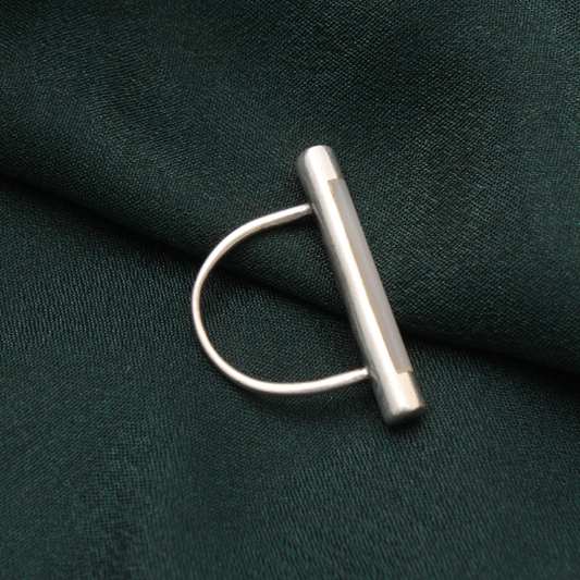Side view of a mother of pearl gemstone silver bar ring in size 8 US.