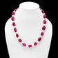 Ruby quartz and pearls beaded necklace upon dummy