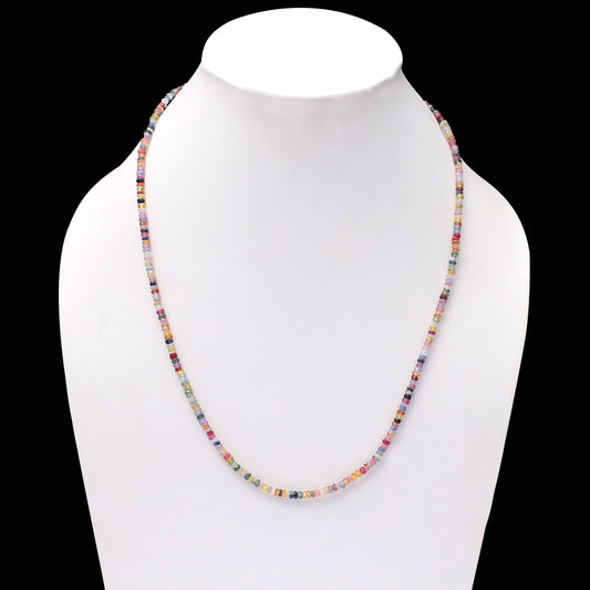 multi sapphire faceted rondelle beaded necklace hand on white necklace dummy