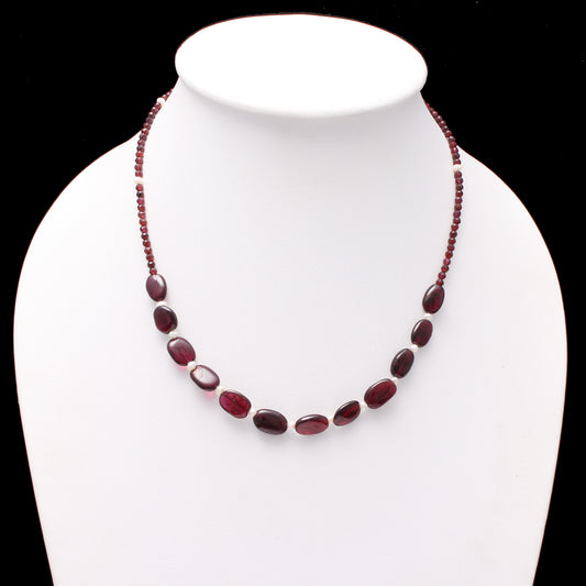 natural garnet oval smooth beaded necklace with garnet tiny balls secures with silver lobster lock