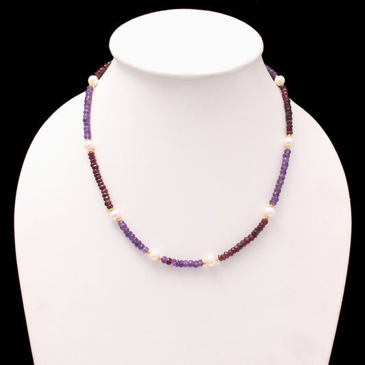 amethyst garnet and pearl necklace on dummy
