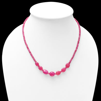 Natural ruby oval and rondelle shaoe beads necklace upon white necklace dummy