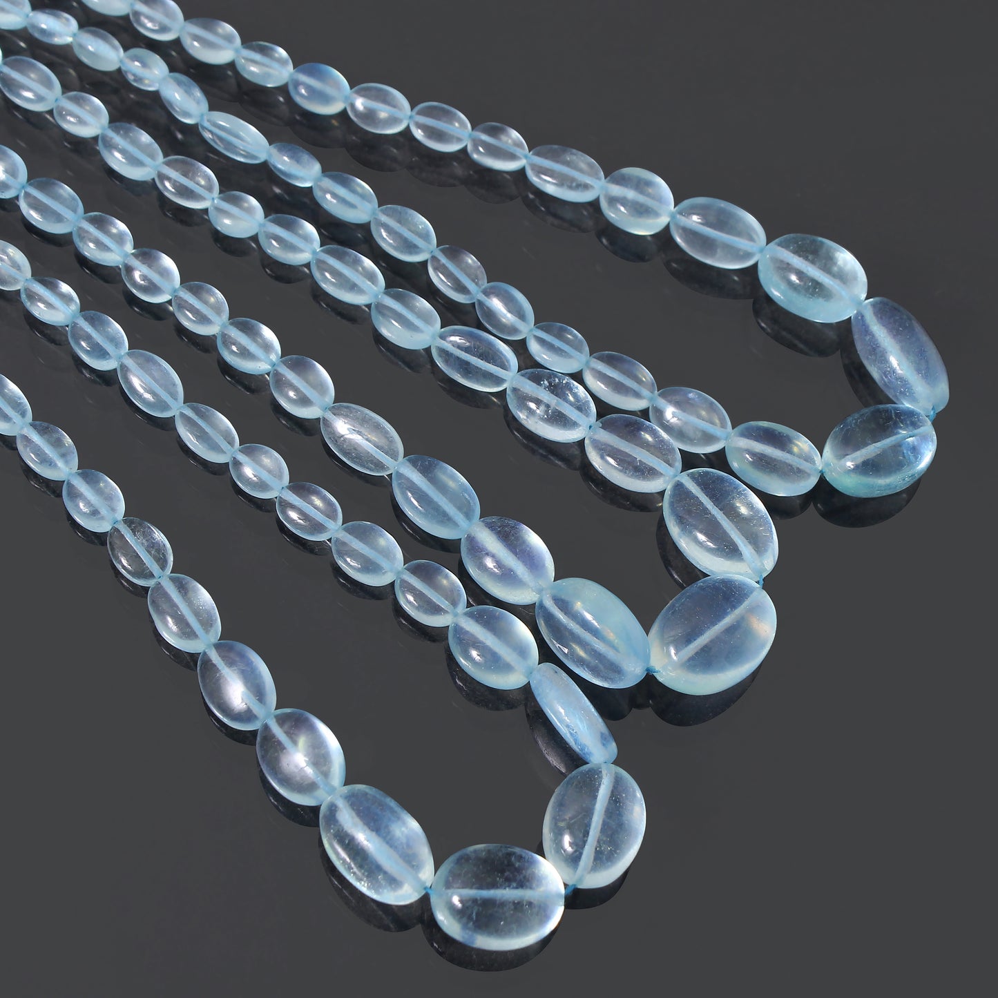 ransform Your Designs with Natural Aquamarine Smooth Oval Beads – 19" Strand