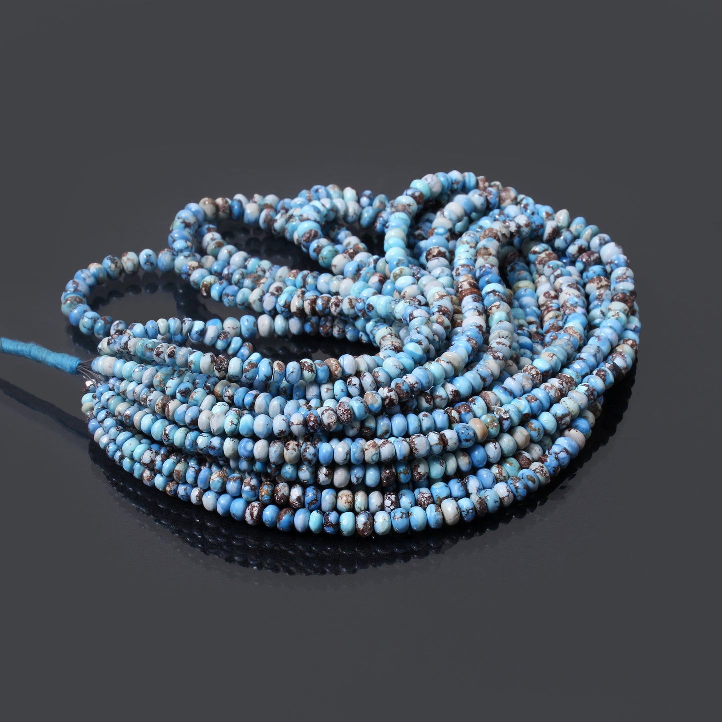 Smooth Golden Hills Turquoise heishi beads close up