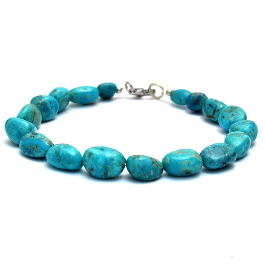 Natural turquoise smooth nugget beaded bracelet secure with sterling silver lobster lock