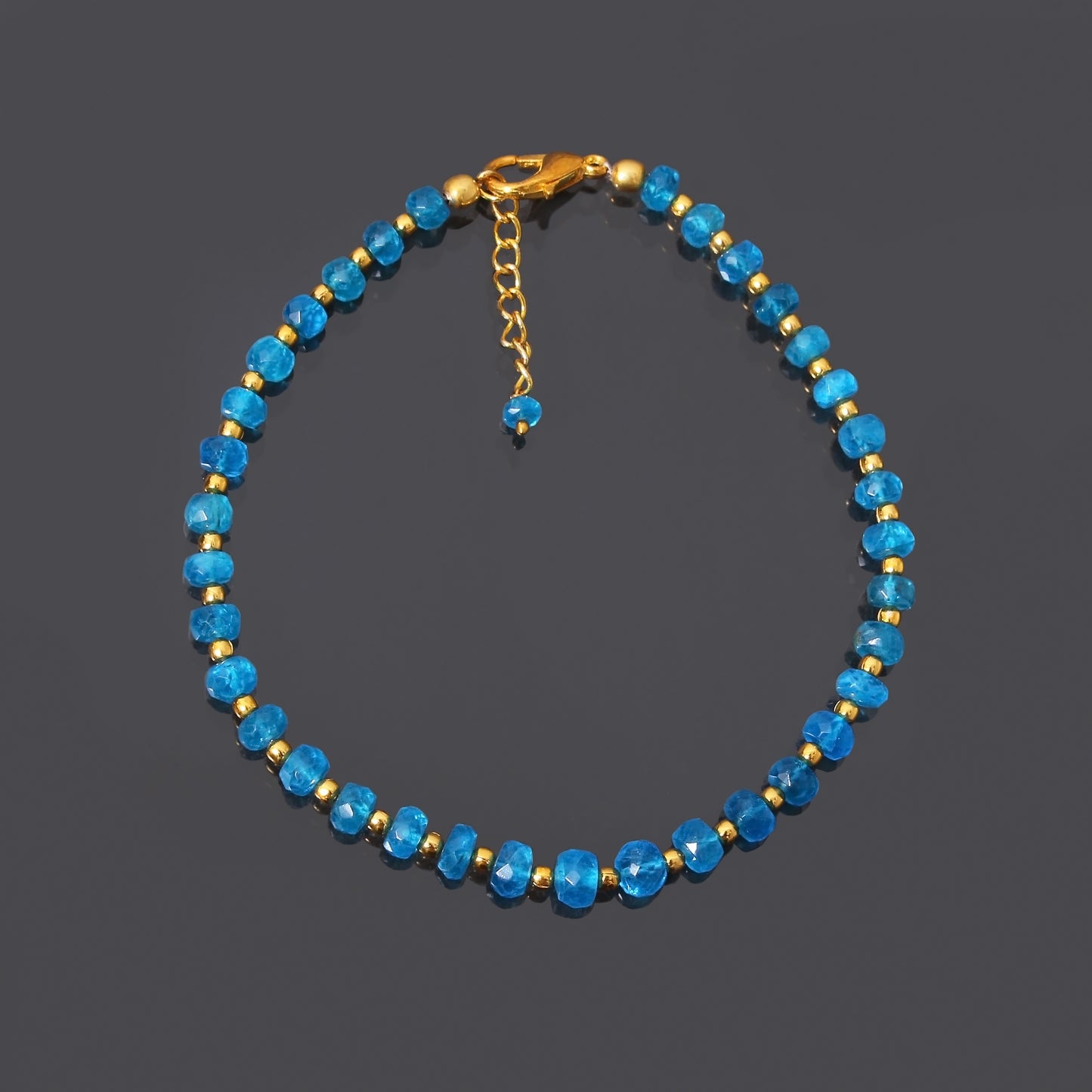 Neon Blue Apatite Gemstone Faceted Rondelle Bracelet with Gold Plated Silver Clasp