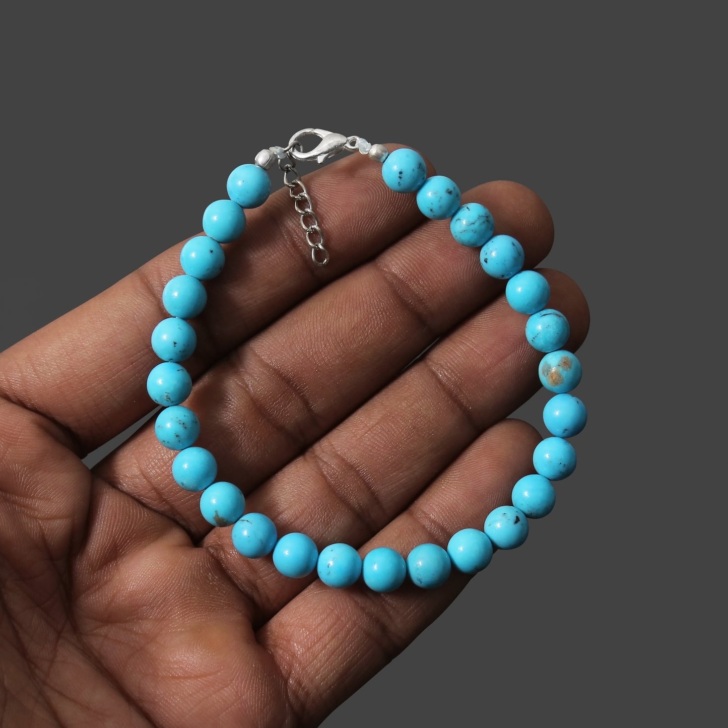 Tranquil Splendor: Turquoise Smooth Round 7mm Bracelet with Lobster Lock