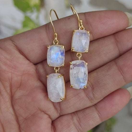 Blue fire rainbow moonstone gold plated sterling silver dangle earrings showing blue flash